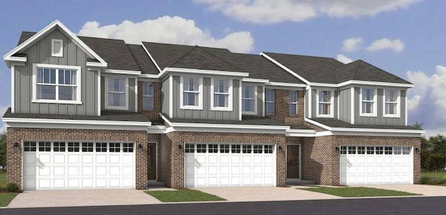 view of front of home featuring board and batten siding, brick siding, and a garage