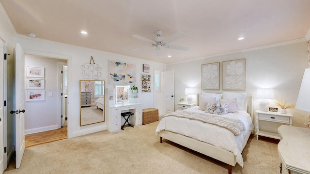 carpeted bedroom with ornamental molding, recessed lighting, and ceiling fan