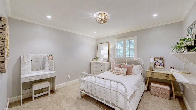 bedroom with ornamental molding, carpet flooring, and baseboards