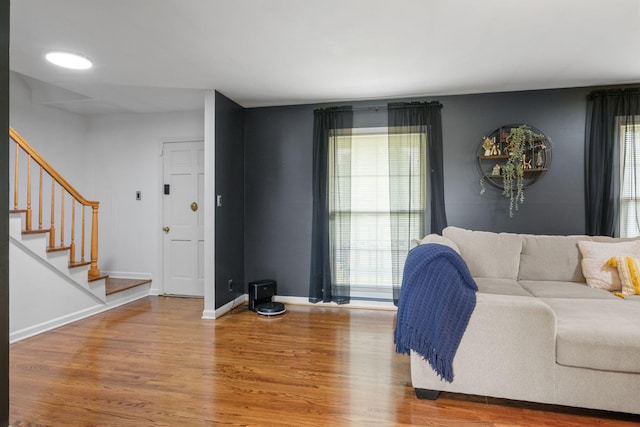 93 Hilltop Dr, Columbia, TN 38401 - living area with baseboards, stairs, wood finished floors, and a wealth of natural light