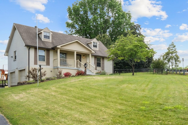 93 Hilltop Dr, Columbia, TN 38401 - cape cod home with fence, a shingled roof, a garage, a porch, and a front yard