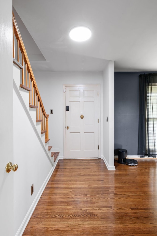 93 Hilltop Dr, Columbia, TN 38401 - entrance foyer featuring baseboards, wood finished floors, and stairway