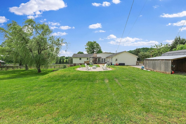 3055 Carters Creek Pike, Franklin, TN 37064 - view of yard featuring a patio area and an outbuilding