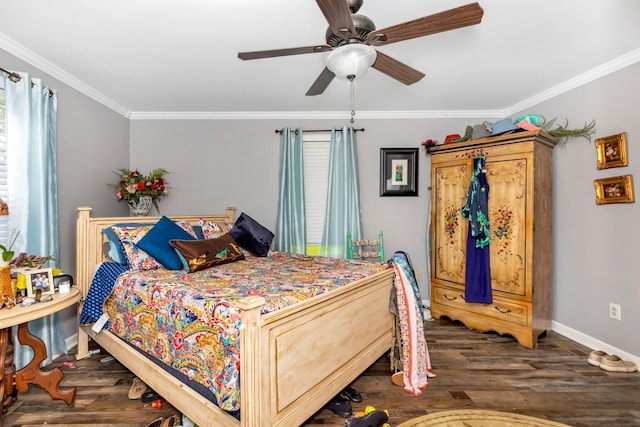 bedroom with crown molding, a ceiling fan, wood finished floors, and baseboards