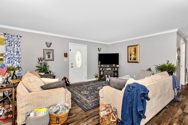 living room featuring dark wood-type flooring, crown molding, and baseboards