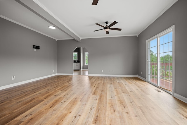 830 Blakemore Rd, Dickson, TN 37055 - empty room with ceiling fan, visible vents, arched walkways, light wood-type flooring, and baseboards