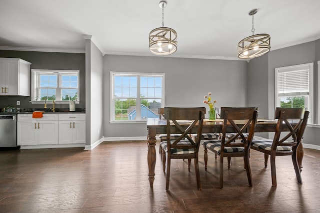 830 Blakemore Rd, Dickson, TN 37055 - dining area featuring crown molding, baseboards, and dark wood-type flooring