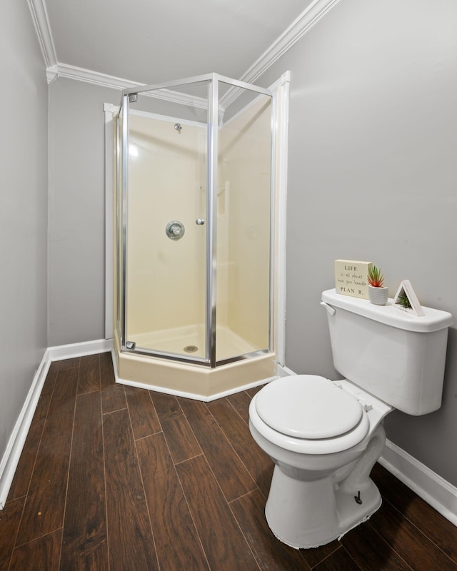 830 Blakemore Rd, Dickson, TN 37055 - bathroom featuring baseboards, ornamental molding, wood finished floors, and a stall shower