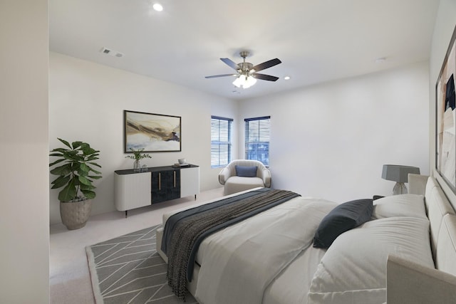 bedroom featuring visible vents, a ceiling fan, carpet flooring, and recessed lighting