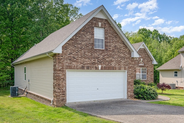 exterior space featuring aphalt driveway and cooling unit