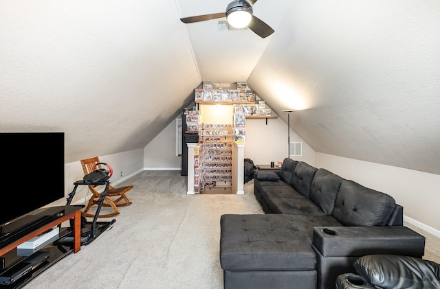 living room featuring visible vents, a ceiling fan, carpet, and baseboards