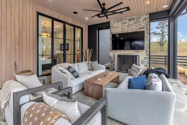 7091 Anna Dr, Brentwood, TN 37027 - view of patio with ceiling fan and an outdoor living space with a fireplace