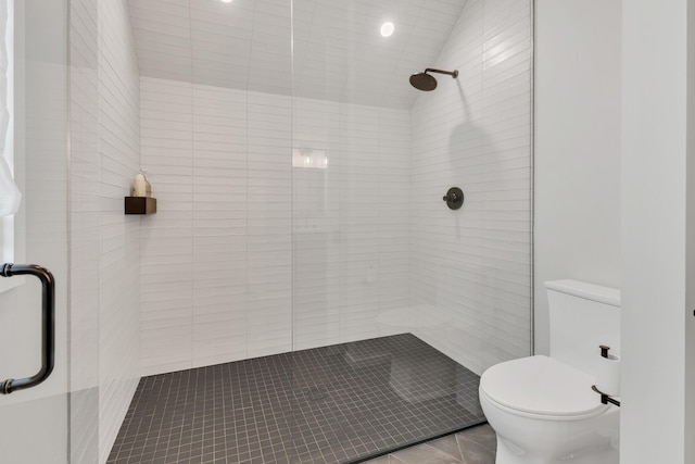 7091 Anna Dr, Brentwood, TN 37027 - full bath featuring lofted ceiling, toilet, tile patterned flooring, and a stall shower