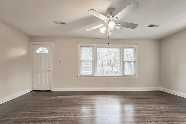 entryway with dark wood-style floors, a ceiling fan, and plenty of natural light