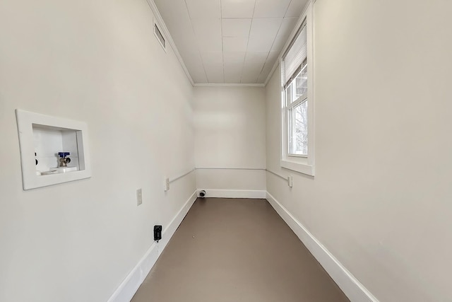 washroom with washer hookup, visible vents, baseboards, ornamental molding, and laundry area