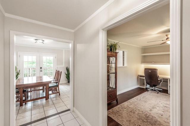 corridor with baseboards, ornamental molding, french doors, and tile patterned flooring