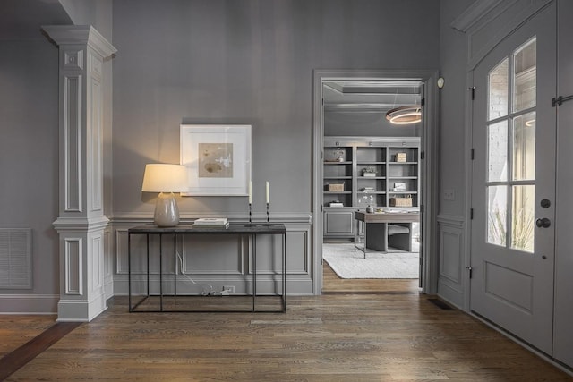 9710 Onyx Ln, Brentwood, TN 37027 - entryway featuring ornate columns, wood finished floors, and visible vents