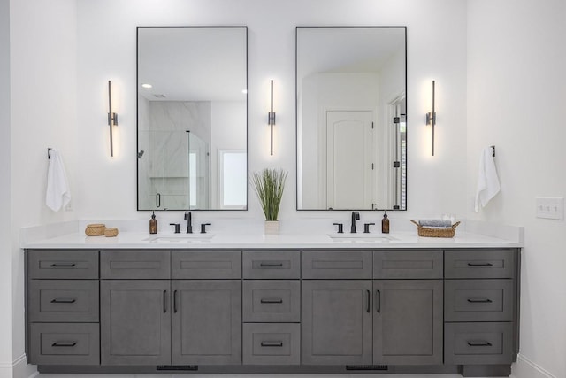 9710 Onyx Ln, Brentwood, TN 37027 - bathroom with a sink, baseboards, a stall shower, and double vanity