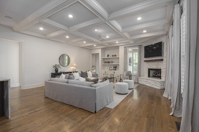 9710 Onyx Ln, Brentwood, TN 37027 - living area with a stone fireplace, recessed lighting, dark wood-type flooring, beamed ceiling, and coffered ceiling