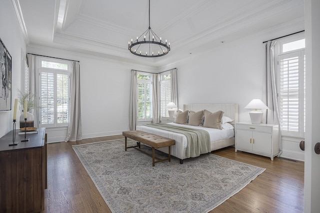 9710 Onyx Ln, Brentwood, TN 37027 - bedroom with dark wood-type flooring, ornamental molding, and a chandelier