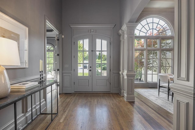 9710 Onyx Ln, Brentwood, TN 37027 - doorway with ornate columns, dark wood-style flooring, and french doors