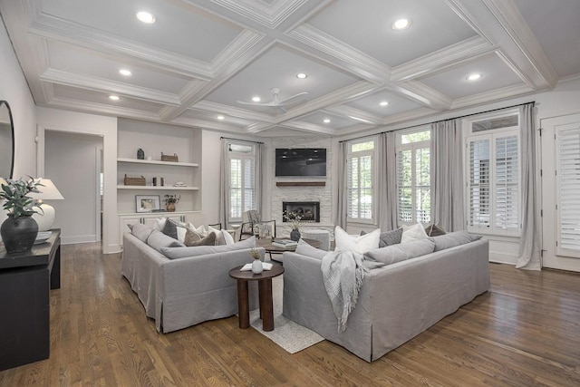 9710 Onyx Ln, Brentwood, TN 37027 - living area featuring a stone fireplace, ornamental molding, coffered ceiling, recessed lighting, and dark wood-type flooring