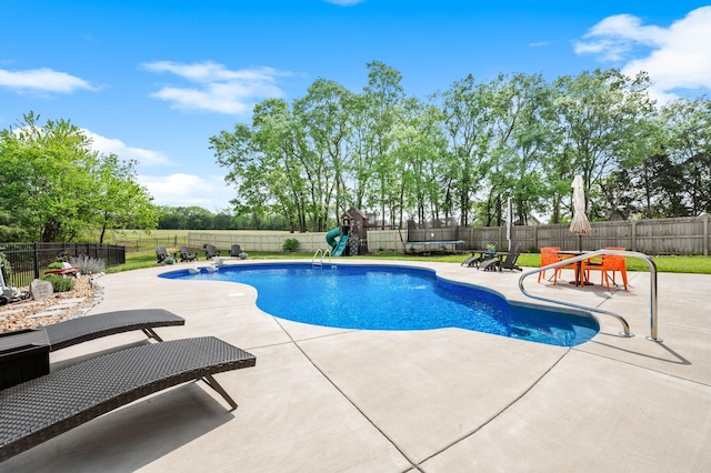 view of pool with a fenced backyard, a fenced in pool, and a patio