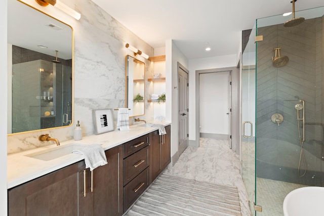 full bath with a sink, double vanity, marble finish floor, a shower stall, and visible vents