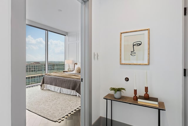 bedroom featuring expansive windows