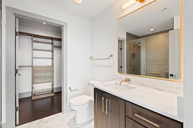 bathroom with a walk in shower, vanity, toilet, recessed lighting, and visible vents