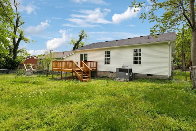 back of house with fence, central AC unit, crawl space, and a wooden deck