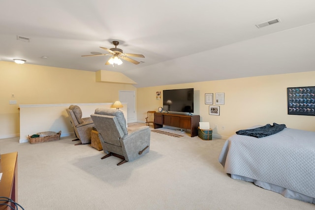 carpeted bedroom with a ceiling fan, baseboards, and vaulted ceiling