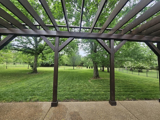 view of yard with a pergola and a patio