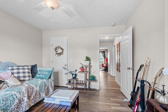 204 Commanche Dr, Hohenwald, TN 38462 - living room featuring baseboards, ceiling fan, and wood finished floors