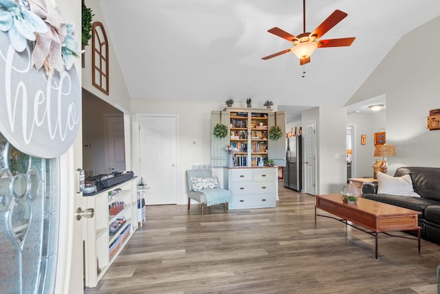 204 Commanche Dr, Hohenwald, TN 38462 - living area featuring high vaulted ceiling, a ceiling fan, and light wood finished floors