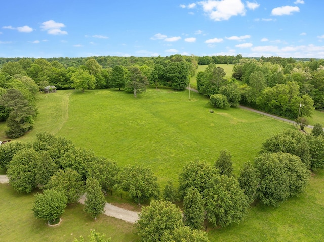 birds eye view of property featuring a rural view