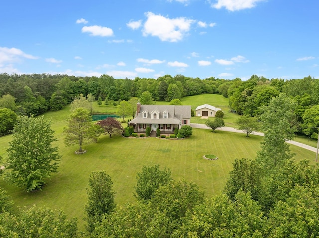 aerial view featuring a view of trees