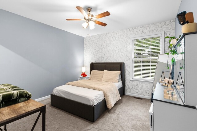 1356 Sayles Cir, Lawrenceburg, TN 38464 - carpeted bedroom featuring visible vents, wallpapered walls, ceiling fan, and baseboards