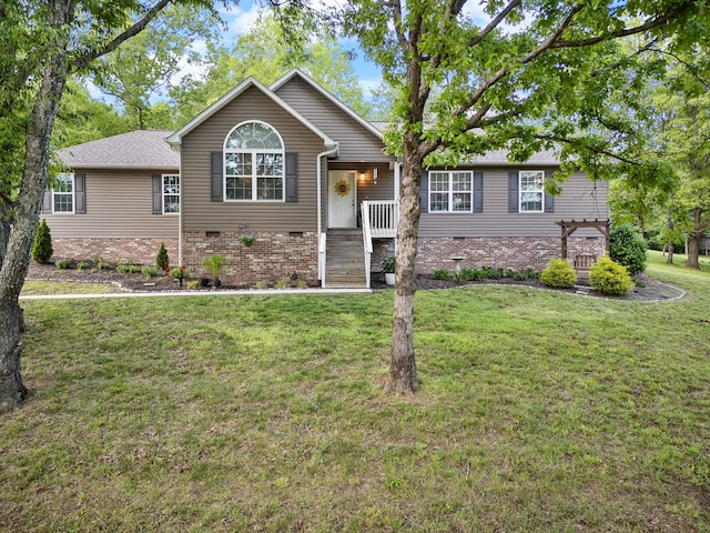 1356 Sayles Cir, Lawrenceburg, TN 38464 - view of front of house featuring brick siding, crawl space, and a front lawn