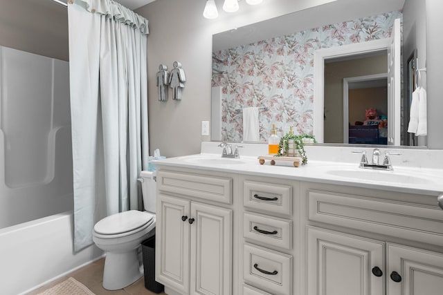 1356 Sayles Cir, Lawrenceburg, TN 38464 - full bathroom featuring double vanity, toilet, wallpapered walls, and a sink