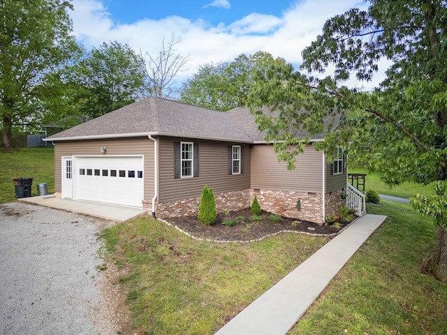 1356 Sayles Cir, Lawrenceburg, TN 38464 - view of property exterior featuring a lawn, gravel driveway, and roof with shingles
