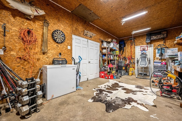 garage featuring fridge