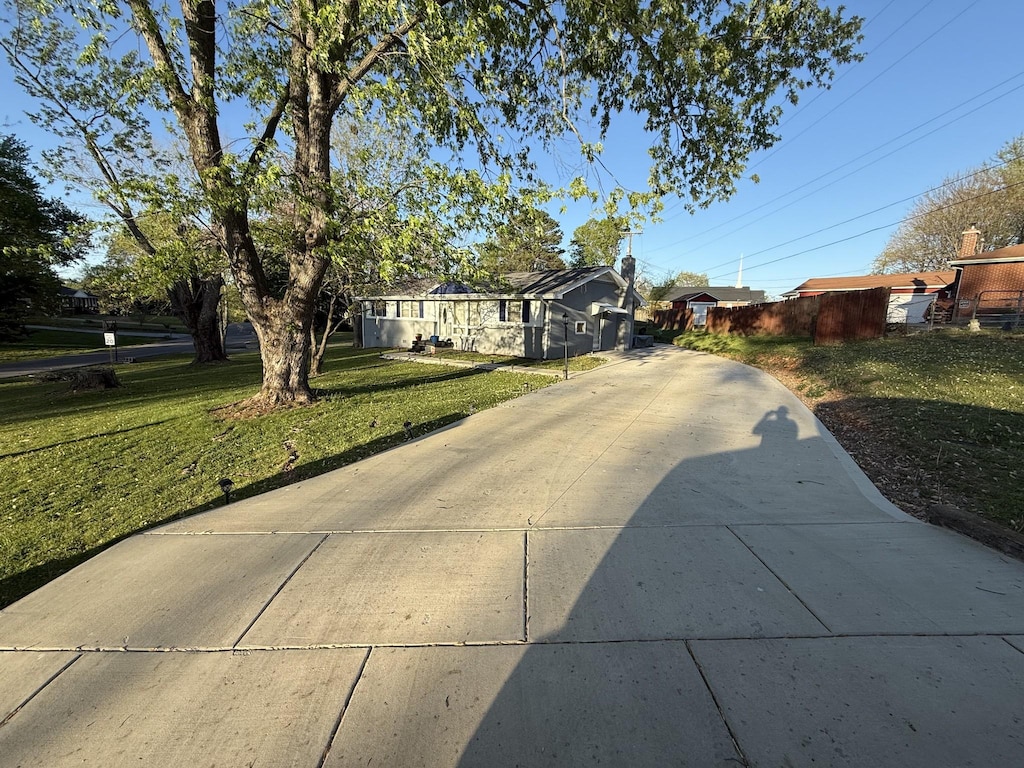 view of street featuring driveway