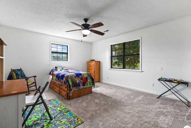 31449 Valley Ln, Prospect, TN 38477 - bedroom featuring a ceiling fan, visible vents, baseboards, a textured ceiling, and carpet floors