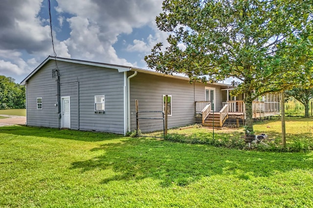 31449 Valley Ln, Prospect, TN 38477 - rear view of property with a lawn and a deck