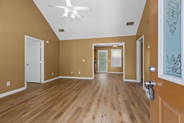 interior space with visible vents, ceiling fan, high vaulted ceiling, and light wood-type flooring