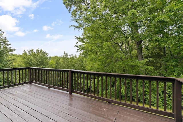 deck featuring a forest view