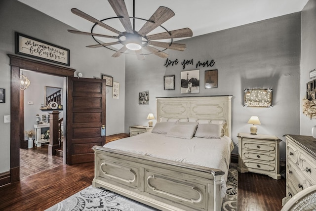 bedroom with dark wood-type flooring and ceiling fan