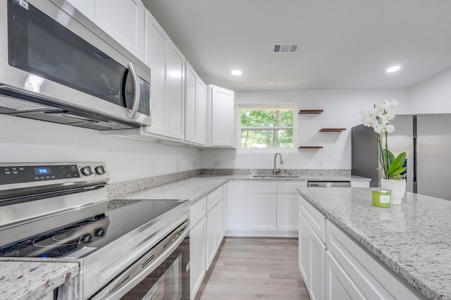 117 Apollo Ct W, Antioch, TN 37013 - kitchen featuring a sink, appliances with stainless steel finishes, and white cabinets