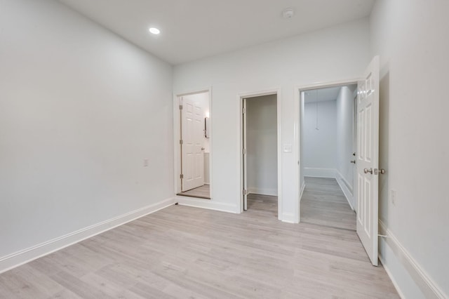 117 Apollo Ct W, Antioch, TN 37013 - unfurnished bedroom with recessed lighting, baseboards, a spacious closet, and light wood finished floors